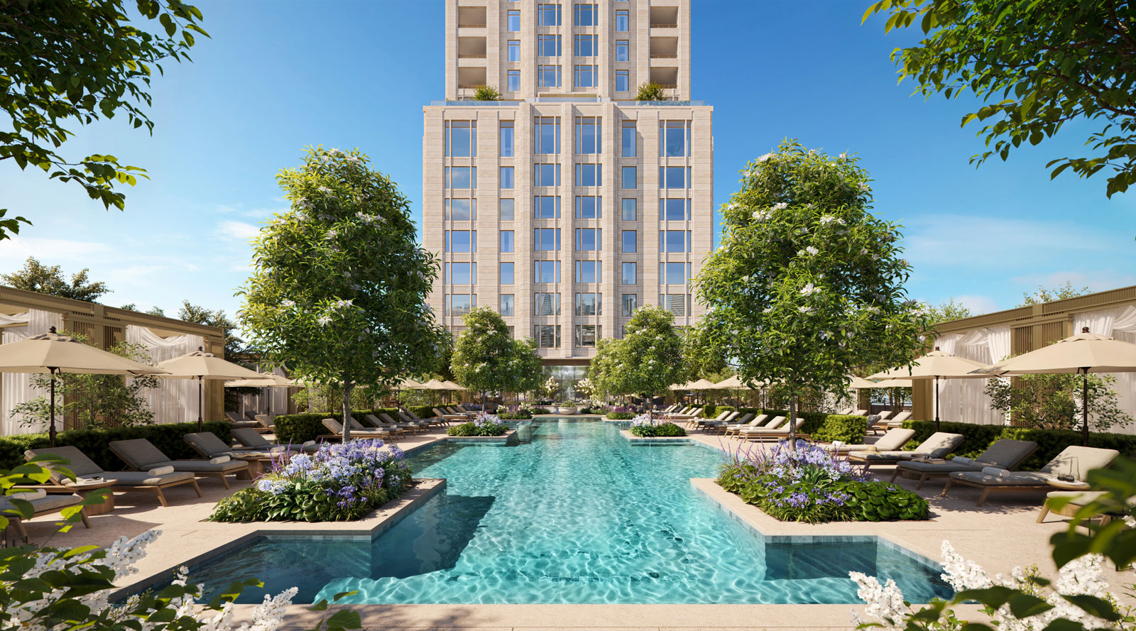 Hotel courtyard with landscaped seating areas and a resort-style pool surrounded by lounge chairs, adjacent to the Ritz-Carlton Residences tower rising above the space.